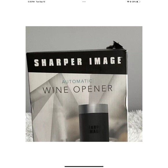 This Sharper Image handheld bottle opener is a must-have for any occasion. With - Picture 9 of 9